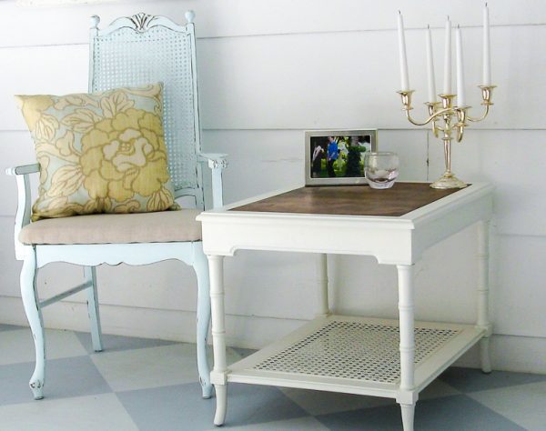 finished bamboo table makeover with wood top, sheet music and white paint.