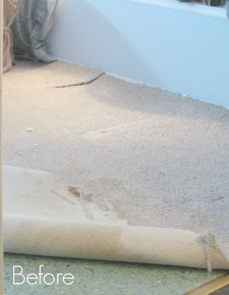 dirty carpet and carpet pad being rolled up