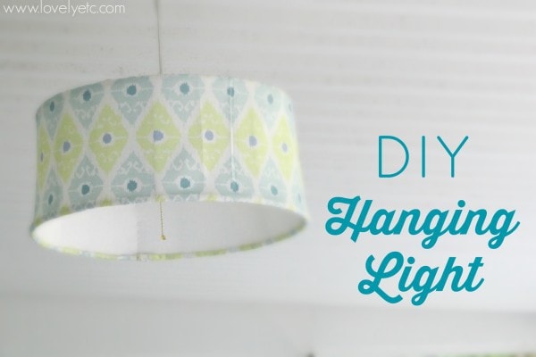 DIY hanging light made from an old lampshade and a tablecloth.