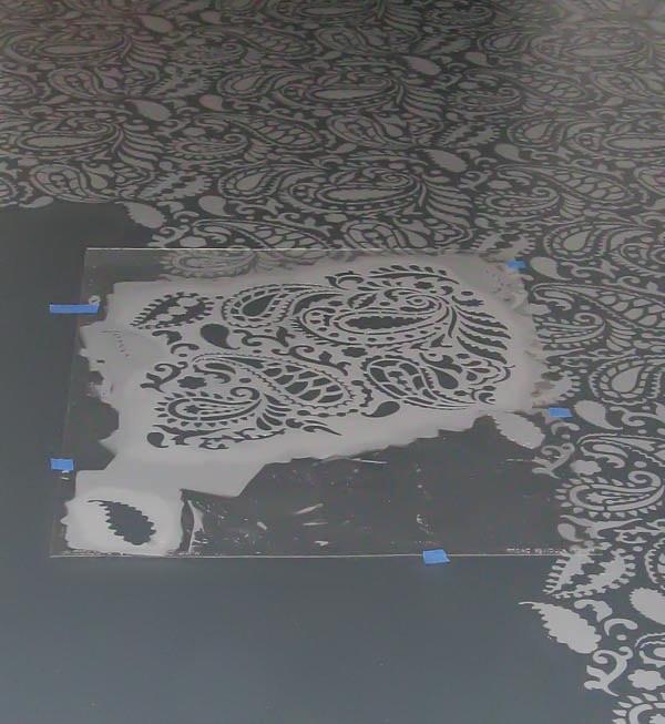 stenciling plywood floor with paisley stencil