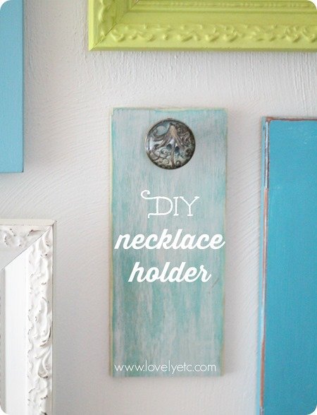 DIY necklace holder made from old jewelry pin with text