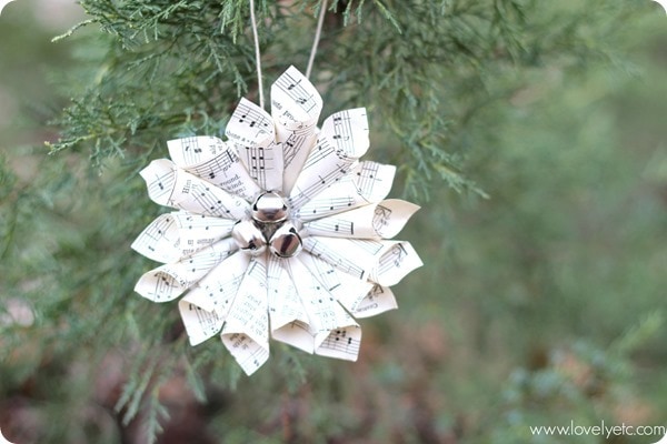 Christmas music wreath hanging on Christmas tree.