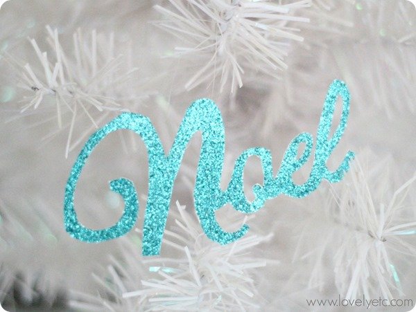 glittery paper noel ornament.