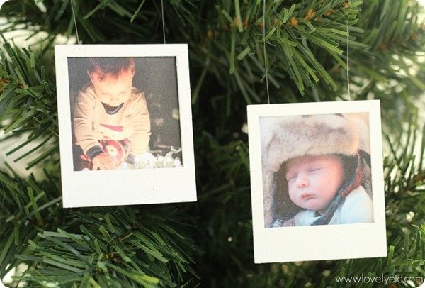 polaroid photo Christmas ornaments hanging on Christmas tree.