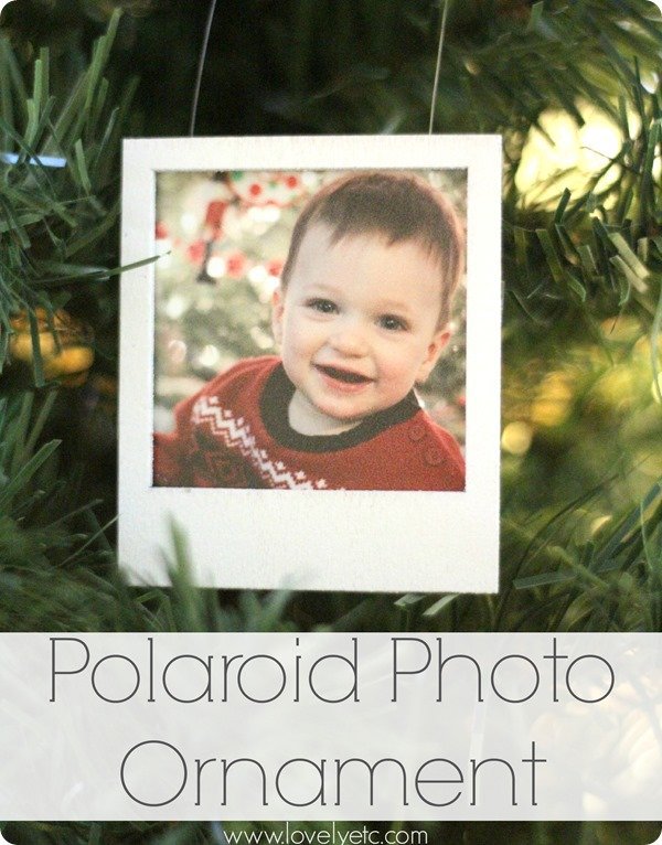 polaroid photo ornament on Christmas tree.