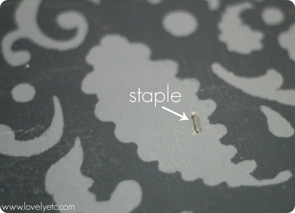 popped staple in plywood floor