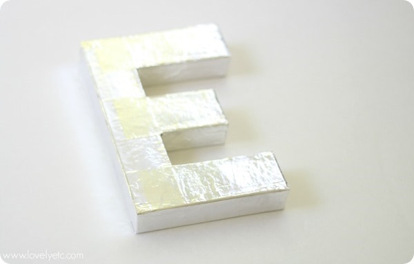 shiny metal letter