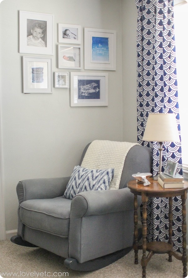 glider and gallery wall in nursery