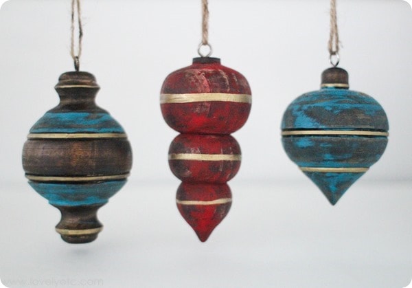 DIY rustic wooden ornaments with gold trim.