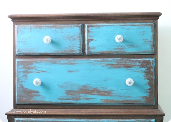 wooden dresser with an ultra distressed wood finish.