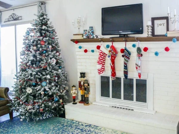 christmas mantel with diy pom pom garland