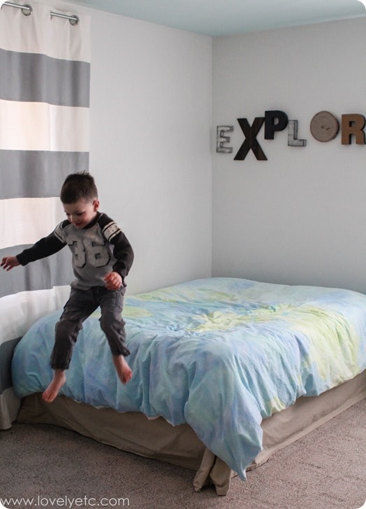 boy jumping off the bed