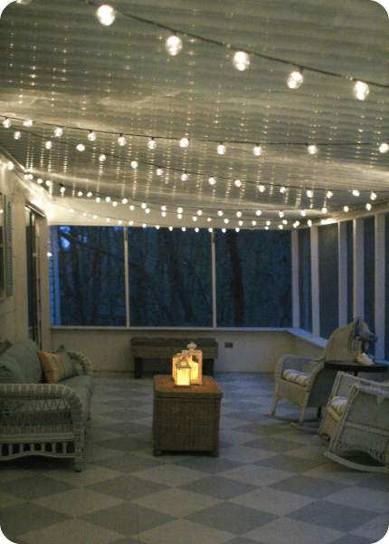 screened porch with string lights