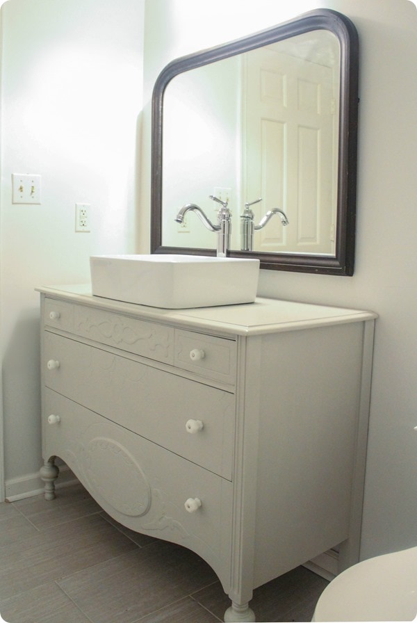 vintage mirror and dresser in bathroom