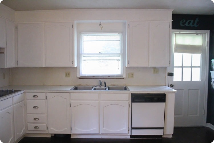 oak kitchen cabinets painted white.