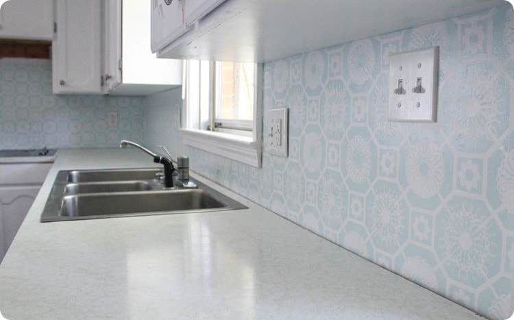 blue and white stenciled backsplash