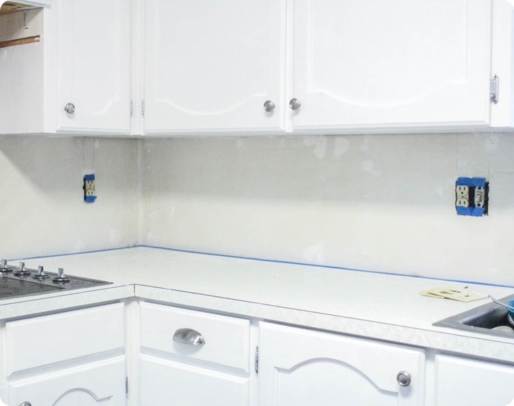 using painter's tape to protect the countertop