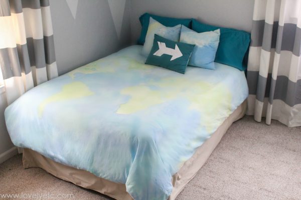 DIY duvet cover painted with a world map design.