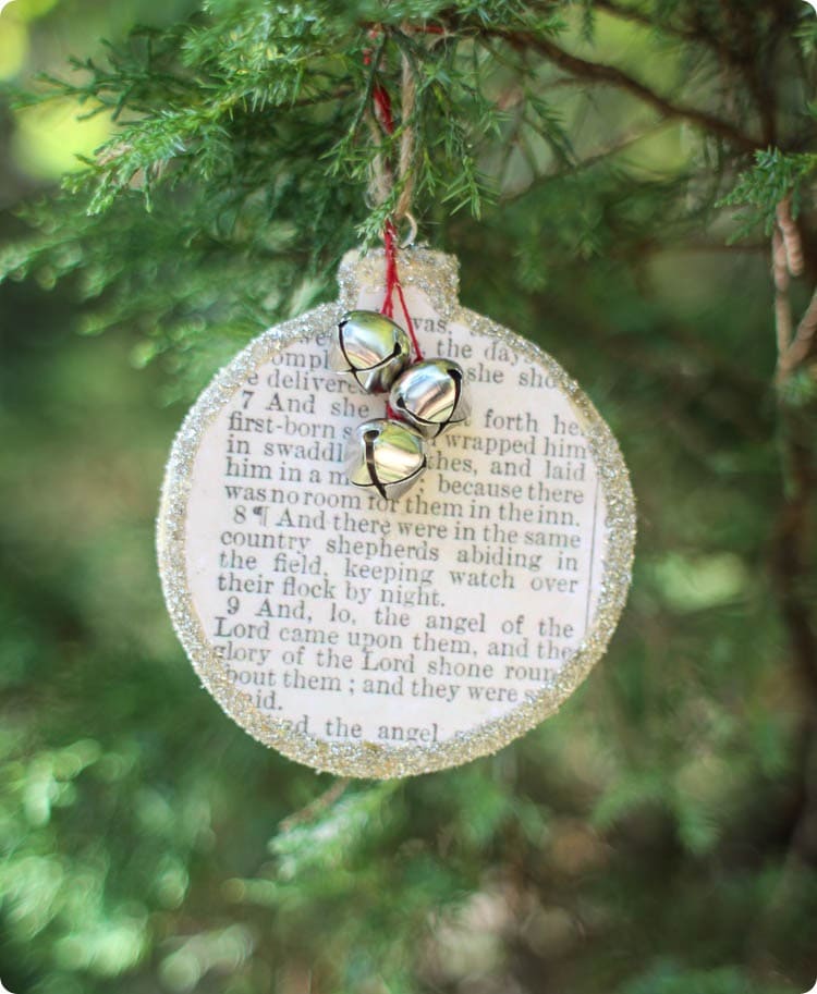 DIY Christmas ornament with the Bible story of Jesus' birth on the front.