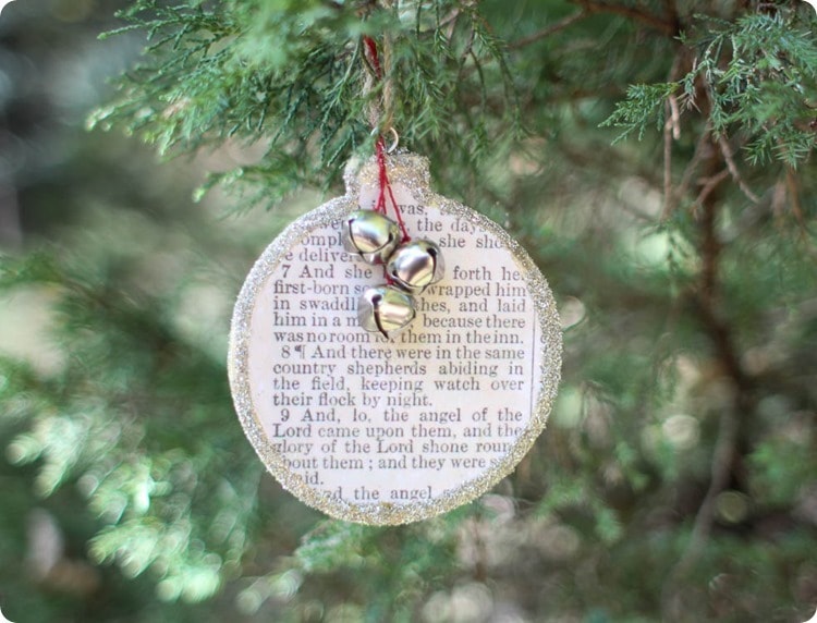 Finished Birth of Christ Christmas ornament hanging on tree.