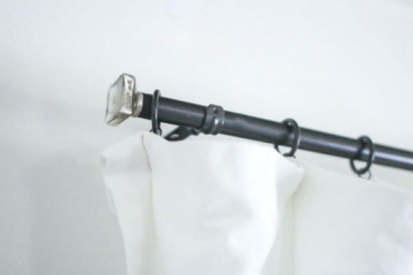 Add style to DIY curtain rods with cheap finials