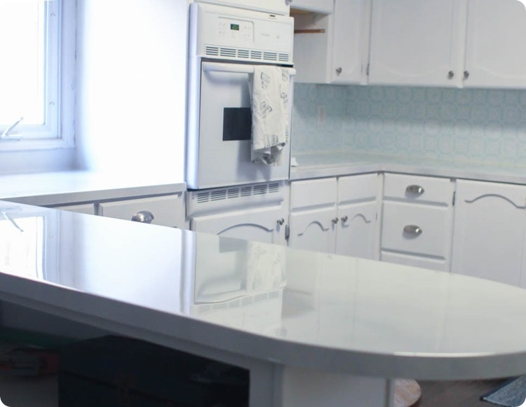 Kitchen with glossy painted countertops