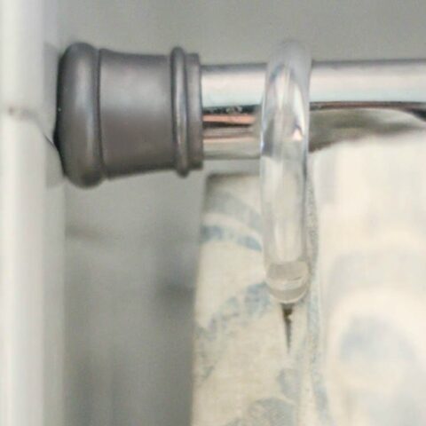 close up of shower curtain rod