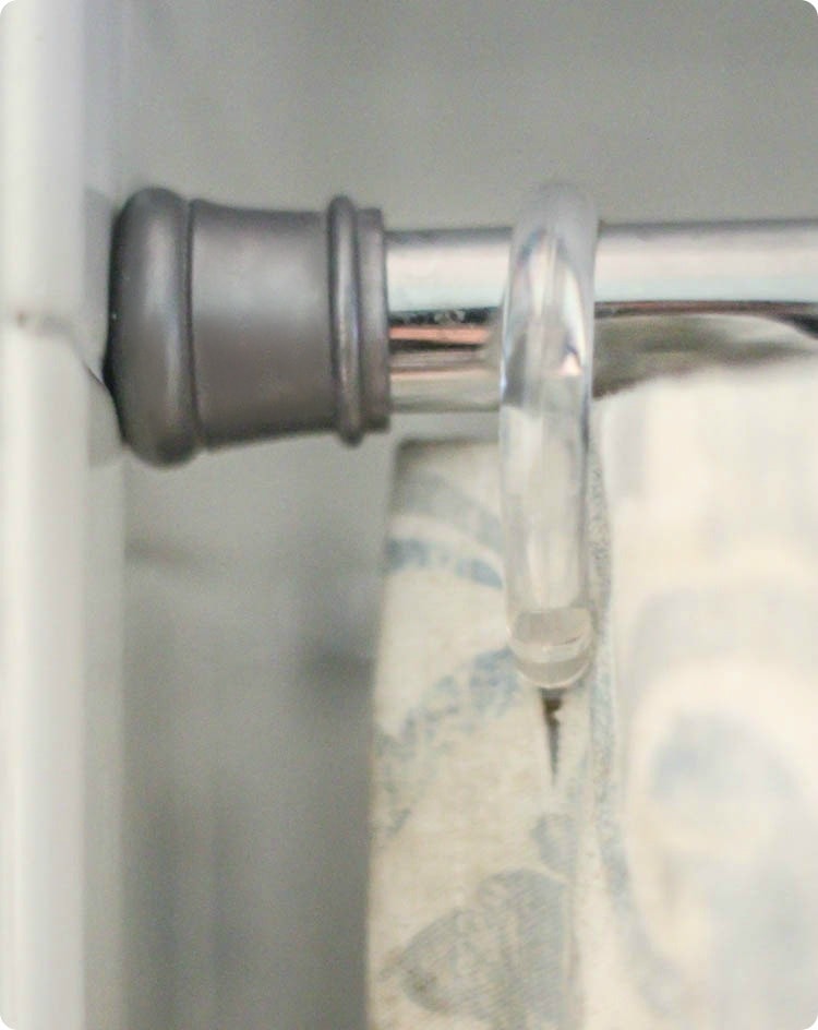 EASY SHOWER CURTAIN HACK! Try raising your shower rod up and