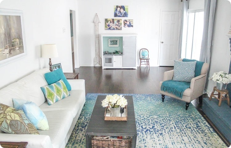 living room decorated in blues and greens