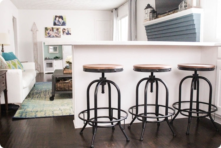 kitchen with stools at counter