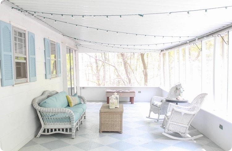 screened in porch with lights