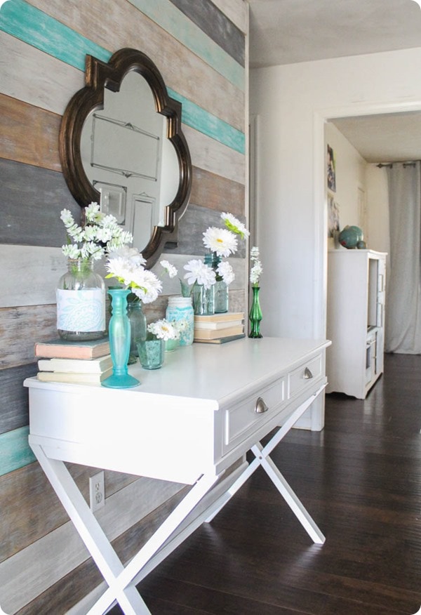 painted plank wall and flowers