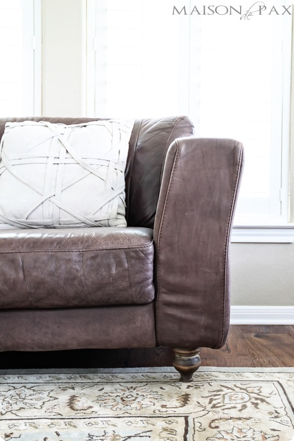 leather couch with replaced couch legs