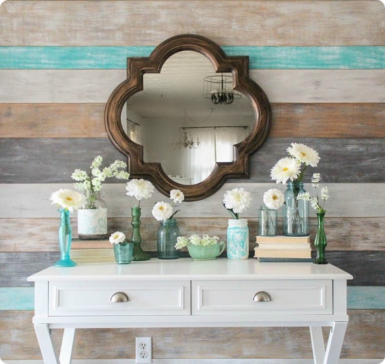 white flowers in mason jars