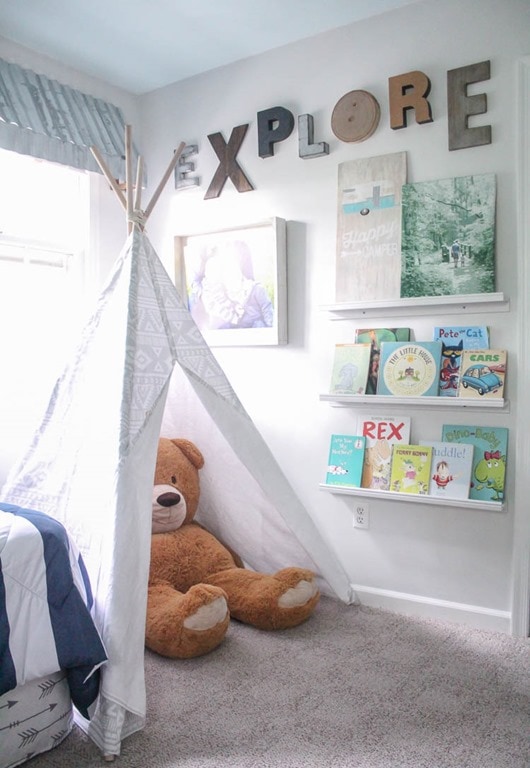 kids room with play tent and huge bear