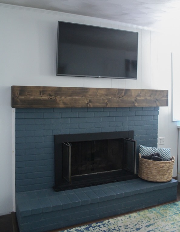 DIY rustic fireplace mantel: the cure for a boring ...