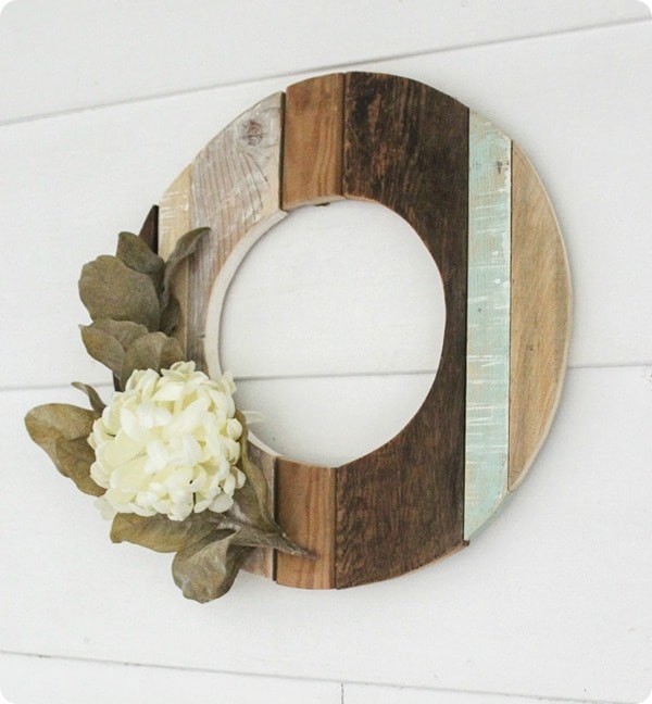 Make a rustic fall wreath using reclaimed wood. Simple DIY wreath that also looks beautiful in spring and summer. Easy step by step directions. 