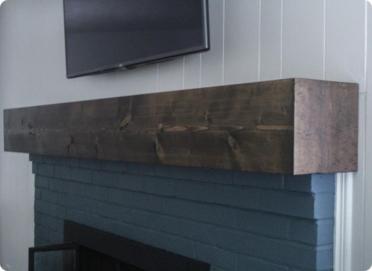 easy and inexpensive diy wood beam mantel.