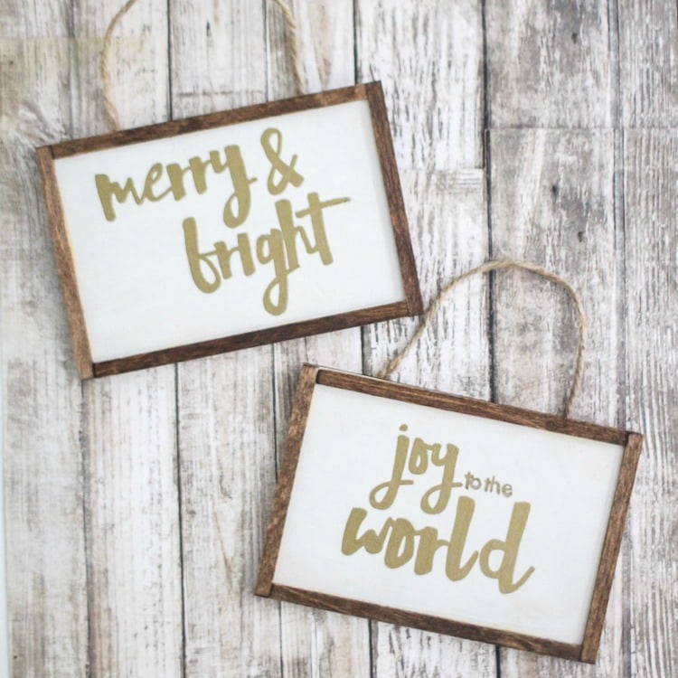 mini farmhouse style Christmas ornaments that say merry and bright and joy to the world.