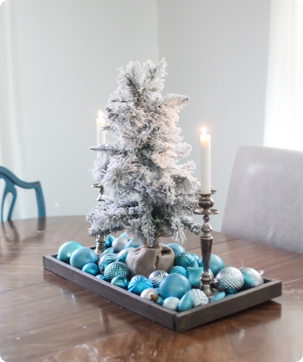 dining room christmas decor with simple christmas ornament centerpiece.