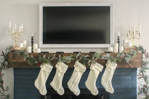 How to create a classic Christmas mantel around an ugly TV
