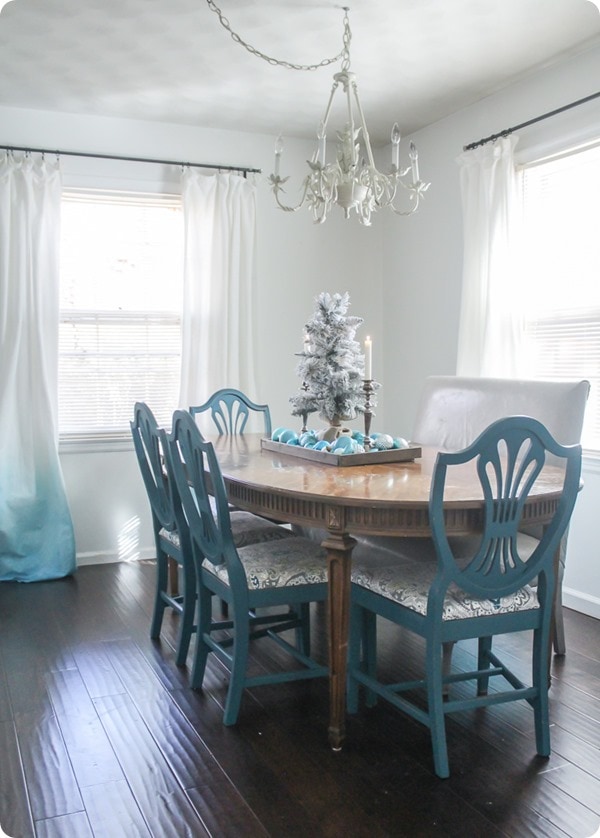 dining room christmas decor with simple christmas ornament centerpiece.