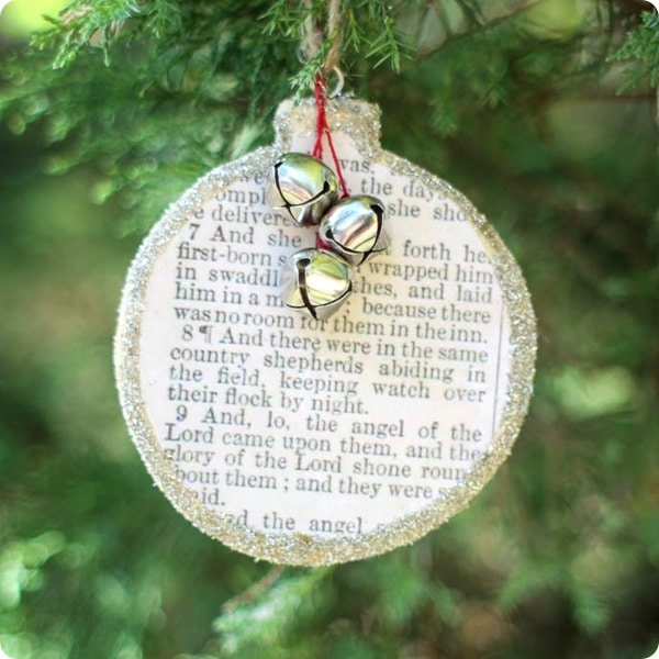DIY Christmas ornament made using a copy of the biblical story of Jesus' birth.