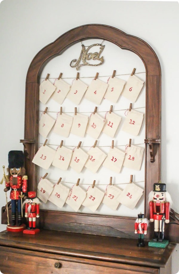 DIY reusable advent calendar on table with nutcrackers.