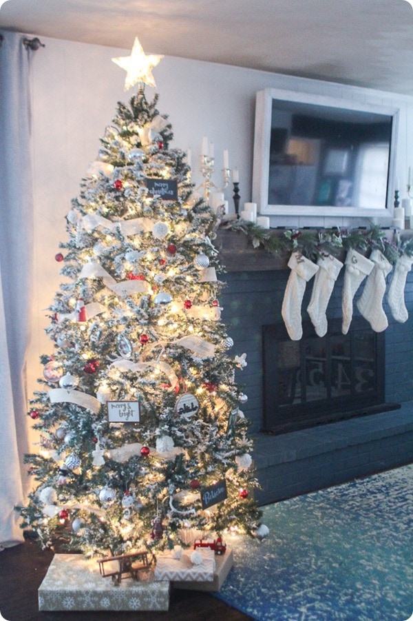 Red and white Christmas tree with lots of lights