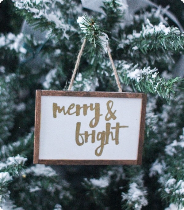 mini farmhouse sign ornament that says merry and bright.