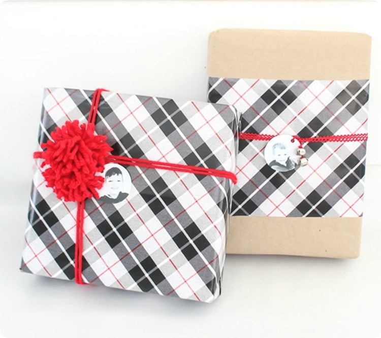 two wrapped gifts with photo gift tags.