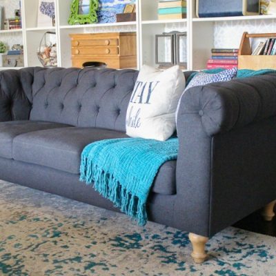 The perfect inexpensive gray tufted sofa