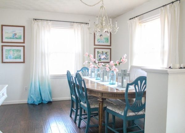 dining room with wood table and blue chairs