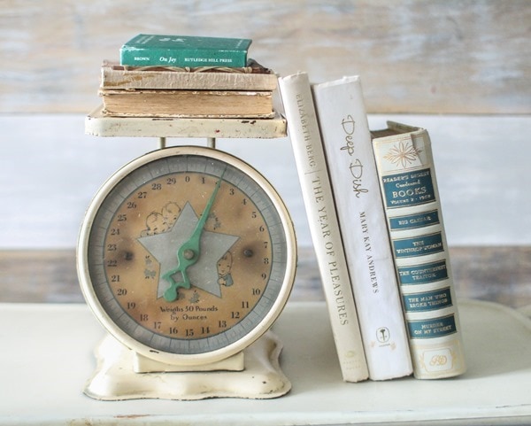 vintage scale and old books